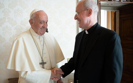 Pope Francis greets Jesuit Fr. James Martin, author and editor at large of America magazine, during a private meeting at the Vatican in this Oct. 1, 2019, file photo. Francis has sent a message of support to a conference that will discuss LGBTQ ministry in the Catholic Church, being held June 16-18 at New York's Fordham University. Martin released the handwritten letter from Francis June 14. (CNS/Vatican Media)