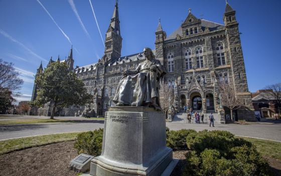 A statue of Baltimore Archbishop John Carroll, the first Catholic bishop in the United States and founder of Georgetown University, is seen on the Jesuit-run school's Washington campus March 3, 2022. The U.S. Supreme Court ruled June 29, 2023, that institutions of higher education can no longer take race into consideration for admission, a landmark decision overturning previous precedent supported by many Catholic universities and colleges. (OSV News photo/CNS file, Chaz Muth)