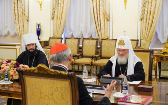 Cardinal Matteo Zuppi, on a peace mission to Moscow on Pope Francis' behalf, speaks with Russian Orthodox Patriarch Kirill of Moscow, right, and Russian Orthodox Metropolitan Anthony of Volokolamsk, head of external church relations for the Moscow Patriarchate, left, during a meeting at the patriarch's residence at the Danilov monastery in Moscow June 29, 2023. (CNS photo/Courtesy of the Russian Orthodox Church, Department for External Church Relations)