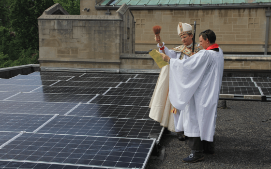 Former Pittsburgh Bishop Dorsey W.M. McConnell and Rev. Noah H. Evans bless the solar panels installed at St. Paul’s Episcopal Church in Mt. Lebanon, Pa. Courtesy St. Paul’s Episcopal.