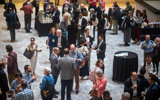 Members of the Catholic Theological Society of America mingle in the exhibit area during the June 8-11 convention in Milwaukee. (Courtesy of Catholic Theological Society of America/Paul Schutz)