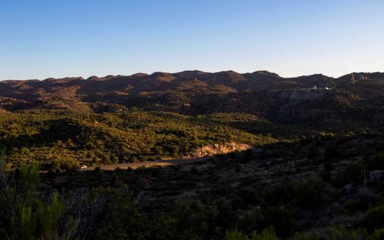 The sun sets over Oak Flat Campground, a sacred site for Native Americans located 70 miles east of Phoenix, on June 3, 2023, in Miami, Ariz.