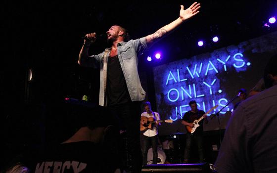 Then-Pastor Carl Lentz leads a Hillsong NYC church service in New York City on July 14, 2013. (AP/Tina Fineberg)