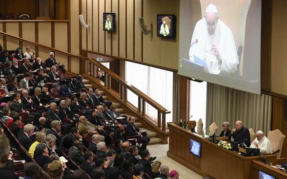 Pope Francis speaks at a Vatican conference, "Pastors and lay faithful called to walk together," Feb. 18 in the Vatican Synod Hall. The meeting was sponsored by the Dicastery for Laity, the Family and Life. (CNS/Vatican Media)