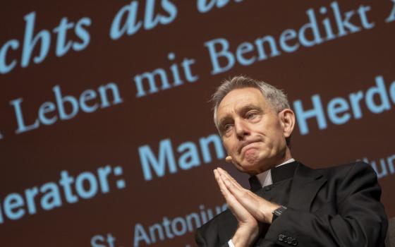  Georg Gaenswein, former private secretary to Pope Benedict XVI, presents his book 'Nothing but the Truth' during a reading in Altoetting, Germany, Saturday, April 15, 2023. Church authorities say the longtime secretary to the late Pope Benedict XVI won’t be given a job in the German archdiocese where he has settled, but will lead some services at Freiburg’s cathedral and can take on “individual assignments” such as confirmations. (Peter Kneffel/dpa via AP, File)