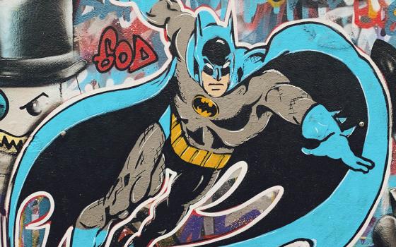 The comic book character Batman is seen depicted in street graffiti. (Pixabay/Luiz Gomes)