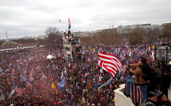 Supporters of then-President Donald Trump clash with Capitol police in Washington Jan. 6, 2021. (CNS/Reuters/Shannon Stapleton)