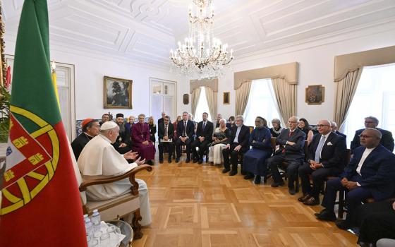 Pope Francis meets with a group representing different faiths and Christian denominations that works on ecumenical and interreligious initiatives in Portugal at the apostolic nunciature in Lisbon Aug. 4. (CNS/Vatican Media)