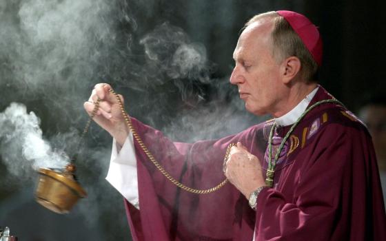 Bishop Howard Hubbard swings incense during an Ash Wednesday communion service, at the Cathedral of the Immaculate Conception, Feb. 25, 2004, in Albany, N.Y. Hubbard, who retired in 2014, died Aug. 19 at age 84. (AP/Jim McKnight, File)