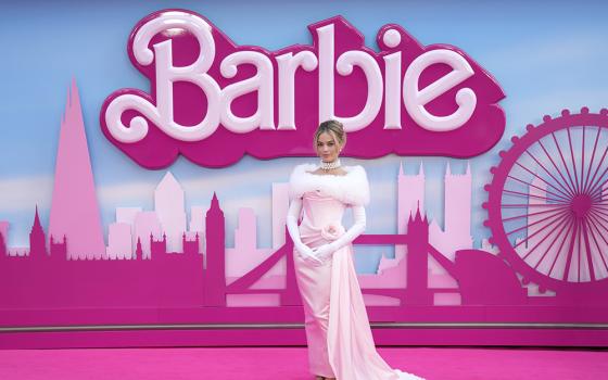 Margot Robbie poses for photographers upon arrival at the premiere of the film "Barbie" in London July 12. (AP/Invision/Scott Garfitt)