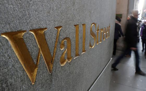 "Wall Street" is marked on a building outside the New York Stock Exchange in New York in this Jan. 3, 2019, file photo. (CNS/Reuters/Shannon Stapleton)