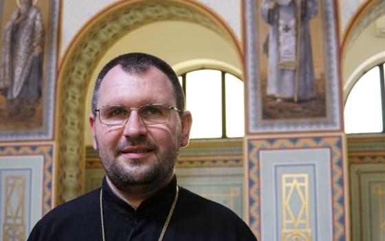 Auxiliary Bishop Maksym Ryabukha of Donetsk, Ukraine, poses for a photo in the chapel of the Ukrainian Pontifical College of St. Josaphat in Rome Sept. 8, 2023. (CNS photo/Justin McLellan)
