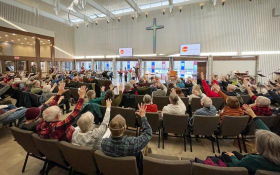 Spirit Catholic Community in Minneapolis blesses children and families baptized on Epiphany in 2023. (Peter Molenda)