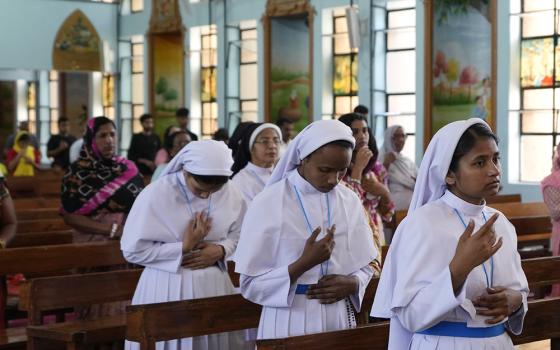 Catholic nuns attend a Mass at a church on Easter Sunday in Jammu, India, April 9. (AP/Channi Anand)