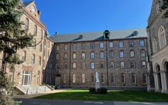 Exterior of three brick buildings in a U-shape