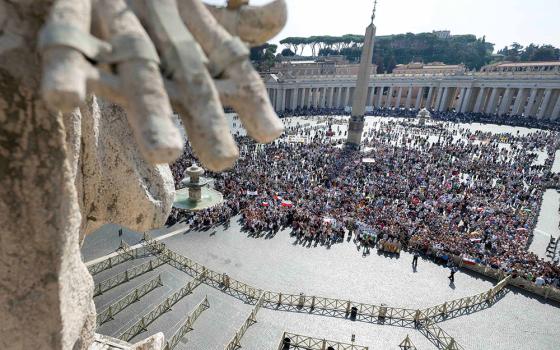 People gather to pray the Angelus with Pope Francis in St. Peter's Square at the Vatican Oct. 1. (CNS/Vatican Media)