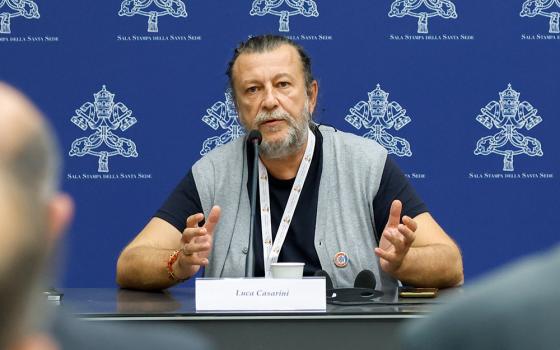 Luca Casarini, a special synod guest from the aid organization Mediterranea Saving Humans, speaks during a briefing about the assembly of the Synod of Bishops at the Vatican Oct. 11. (CNS/Lola Gomez)