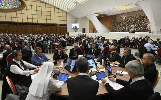 Participants in the assembly of the Synod of Bishops meeting in the Paul VI Audience Hall at the Vatican Oct. 25. (CNS/Vatican Media)