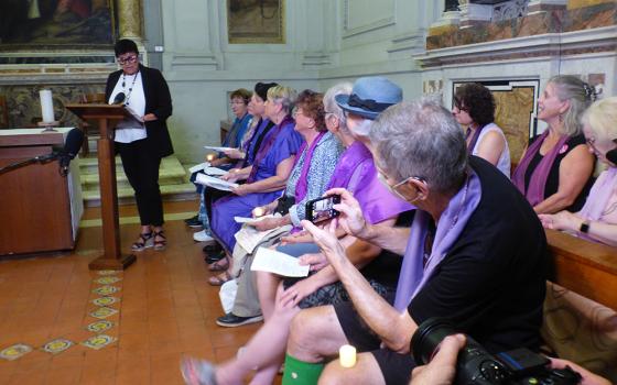 Participants in the Oct. 3 "Let Her Voice Carry" prayer vigil hosted by women's ordination advocates at Rome's Basilica of St. Praxedes. (NCR photo/Rhina Guidos)