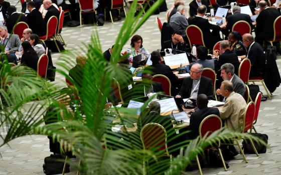 Members of the assembly of the Synod of Bishops, organized into 35 groups based on language, begin their small-group discussions 