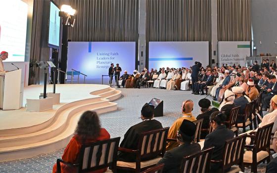 Cardinal Pietro Parolin, left, addresses the Global Faith Leaders Summit, Nov. 7, 2023, in Abu Dhabi. (Photo courtesy of Muslim Council of Elders)