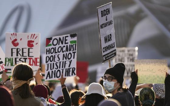 Demonstrators protest the Israel-Hamas war and call for an immediate cease-fire in the conflict as they march in downtown Atlanta, Oct. 20. (AP/Mike Stewart)