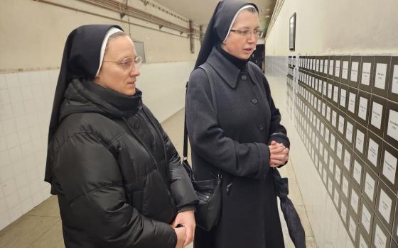 Two nuns pray at At a memorial site at the hospital in Vukovar, Croatia.