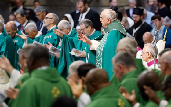 Pope Francis prays during Mass in St. Peter's Basilica at the Vatican Oct. 29, marking the conclusion of the first session of the Synod of Bishops on synodality. (CNS/Lola Gomez)