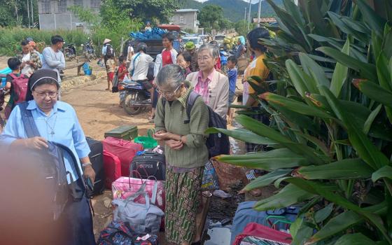 Catholic sisters and others in Loikaw, Myanmar, prepare to leave as the fighting becomes more intense in November. (Courtesy of Sister Florence) 