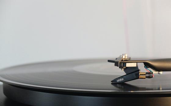 A record player is seen in a closeup photo. (Unsplash/Adrian Korte)