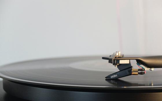 A record player is seen in a closeup photo. (Unsplash/Adrian Korte)