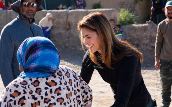 Kerri Murray, president of ShelterBox USA, interacts with townspeople in the Atlas Mountains in Morocco in November. 