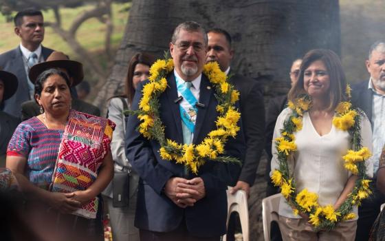 Guatemalan President Bernardo Arévalo, center, and Vice President Karin Herrera, right, attend an Indigenous ceremony held in their honor at the sacred Mayan site of Kaminaljuyu in Guatemala City,  Jan. 16 the day after they were inaugurated.