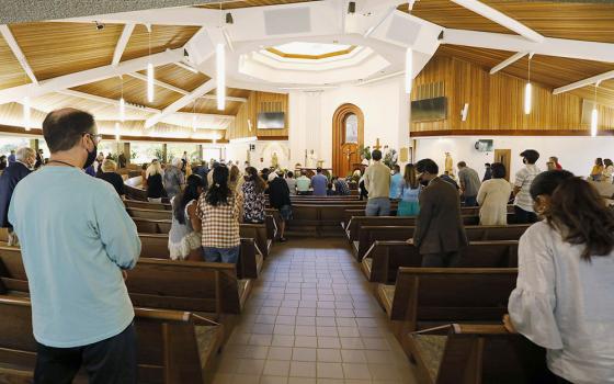 Bishop Robert McElroy of San Diego celebrates a bilingual Mass for Earth Week at St. James Church in Solana Beach, California, April 17, 2021. (CNS/The Southern Cross/John Gastaldo)