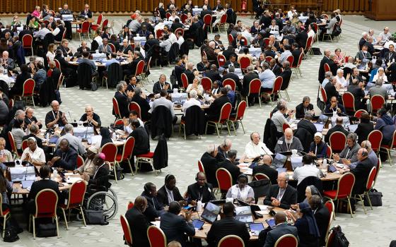 Members of the assembly of the Synod of Bishops start a working session in the Vatican's Paul VI Audience Hall Oct. 18, 2023. (CNS/Lola Gomez)