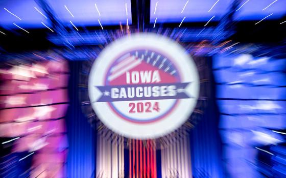 Signage for the 2024 Iowa caucuses is seen taken with a long exposure at the Iowa Caucus Media Center located within the Iowa Events Center in Des Moines Jan. 14. (OSV News/Reuters/Cheney Orr)