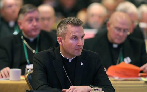 Bishop Ronald Hicks of Joliet, Illinois, is pictured during the 2018 fall general assembly of the U.S. Conference of Catholic Bishops in Baltimore. Sixteen parishes in the Joliet Diocese will be reconfigured into seven parishes, with five churches closing, in order to optimize the diocese's resources for its future and evangelization efforts, Hicks announced Jan. 25. (OSV News/CNS file, Bob Roller)