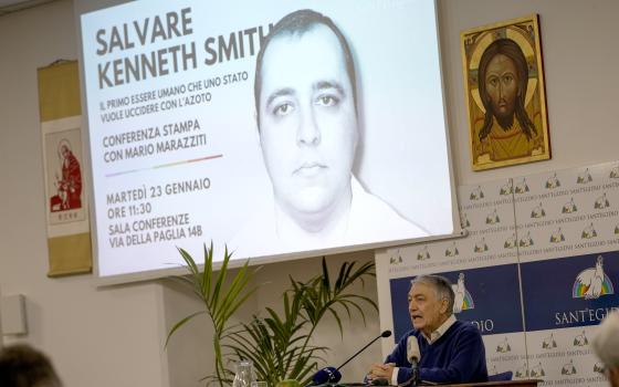 Mario Marazziti, of the Vatican-affiliated Sant' Egidio Community, talks to reporters during a press conference in Rome Jan. 23.