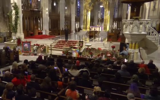 Actor and director Billy Porter sings "Give Us This Day" to a packed St. Patrick's Cathedral in New York City as friends and family gathered to honor the life of LGBTQIA+ activist Cecilia Gentili on Feb. 15.