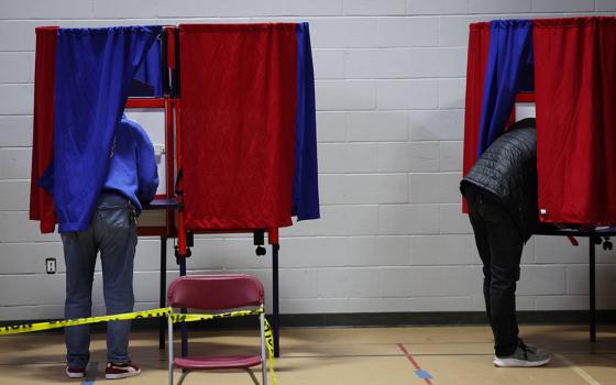 Voters cast their ballots at the Webster School in Manchester, N.H., shortly after polls opened in the New Hampshire presidential primary election Jan. 23, 2024. (OSV News/Reuters/Mike Segar)