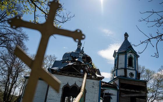 A view of a 19th-century wooden church, damaged by a rocket attack during the Russian invasion of the Zhytomyr region of Ukraine April 28, 2022. (OSV News/Reuters/Viacheslav Ratynskyi)