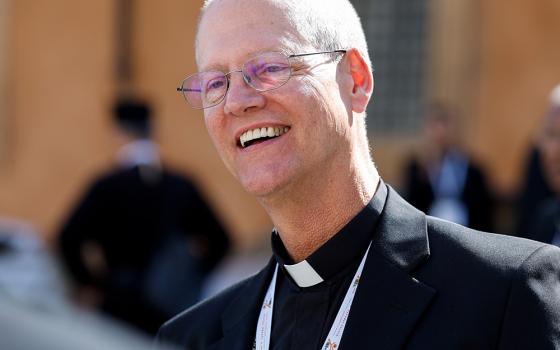 Archbishop Paul Etienne of Seattle leaves the Vatican's Paul VI Audience Hall Oct. 6, 2023, after a morning session of the assembly of the Synod of Bishops. (CNS/Lola Gomez)