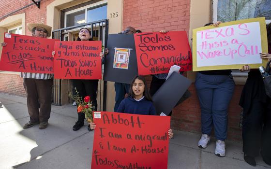 Honesty Tercero, 11, demonstrates with fellow residents their support for Annunciation House, a network of migrants shelters Feb. 23 in El Paso, Texas. Texas Attorney General Ken Paxton filed a lawsuit claiming the Annunciation House "appears to be engaged in the business of human smuggling" and is threatening to terminate the nonprofit's right to operate in Texas. (AP photo/Andres Leighton)