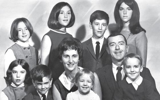 Meg Kissinger is pictured in a family portrait, far left in the top row. Kissinger, for many years a Milwaukee Journal Sentinel investigative journalist, has written the memoir While You Were Out: An Intimate Family Portrait of Mental Illness in an Era of Silence. (Courtesy of Meg Kissinger)