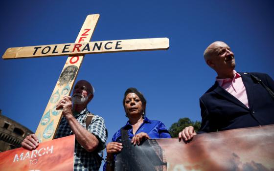 Advocates for zero tolerence of clergy sexual abuse including Tim Law, left, Denise Buchanan and Peter Isely attend a march with survivors of clergy sexual abuse and activists near the Vatican in Rome Sept. 27, 2023. (OSV News photo/Guglielmo Mangiapane, Reuters)