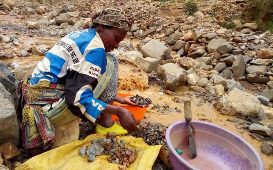 Miner working in Congolese artisanal gold mine
