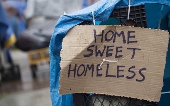 A sign is pictured in a file photo at a homeless encampment in Seattle. (OSV News/Reuters/David Ryder)