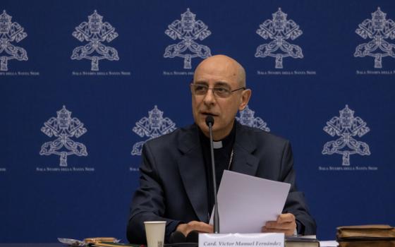 Cardinal Víctor Manuel Fernández, prefect of the Dicastery for the Doctrine of the Faith, speaks at a news conference to present the dicastery's declaration, "Dignitas Infinita" ("Infinite Dignity") on human dignity at the Vatican press office April 8, 2024. (CNS photo/Pablo Esparza)