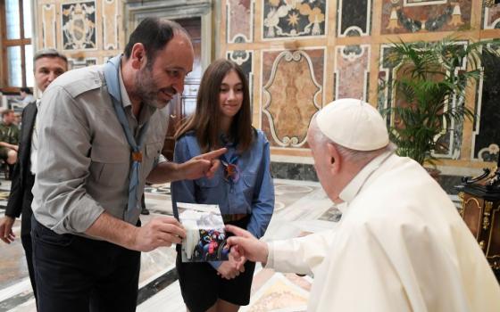 Pope Francis greets members of the Italian Catholic Movement of Adult Scouts during a meeting at the Vatican April 13, 2023. (CNS photo/Vatican Media)