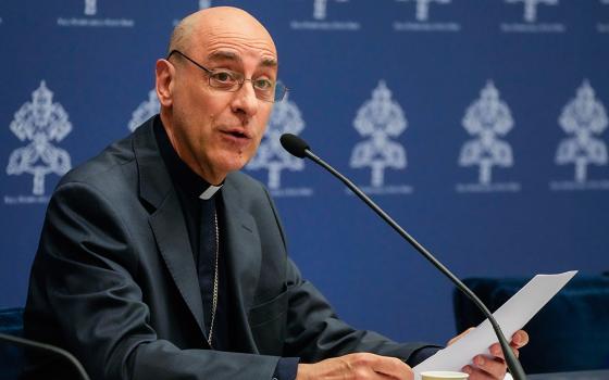 The prefect of the Vatican's Dicastery for the Doctrine of the Faith, Cardinal Víctor Manuel Fernández, presents the declaration Dignitas Infinita during a news conference at the Vatican April 8. (RNS/AP/Gregorio Borgia)